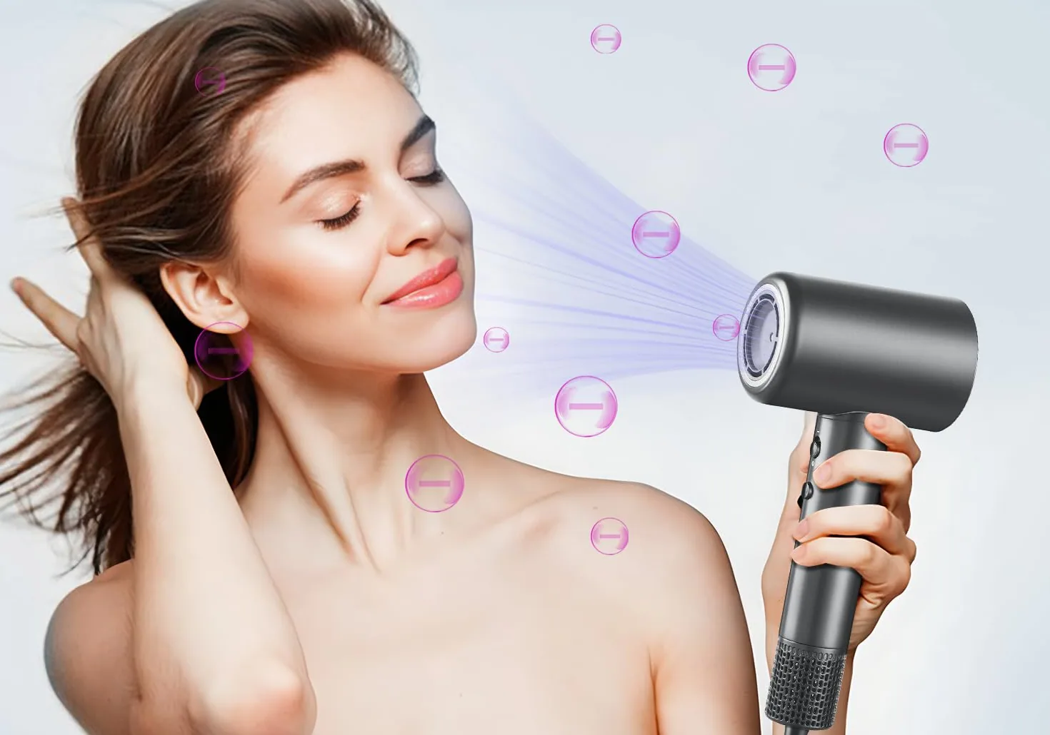 A woman drying her hair with the grey CONFU K13 high-speed dryer