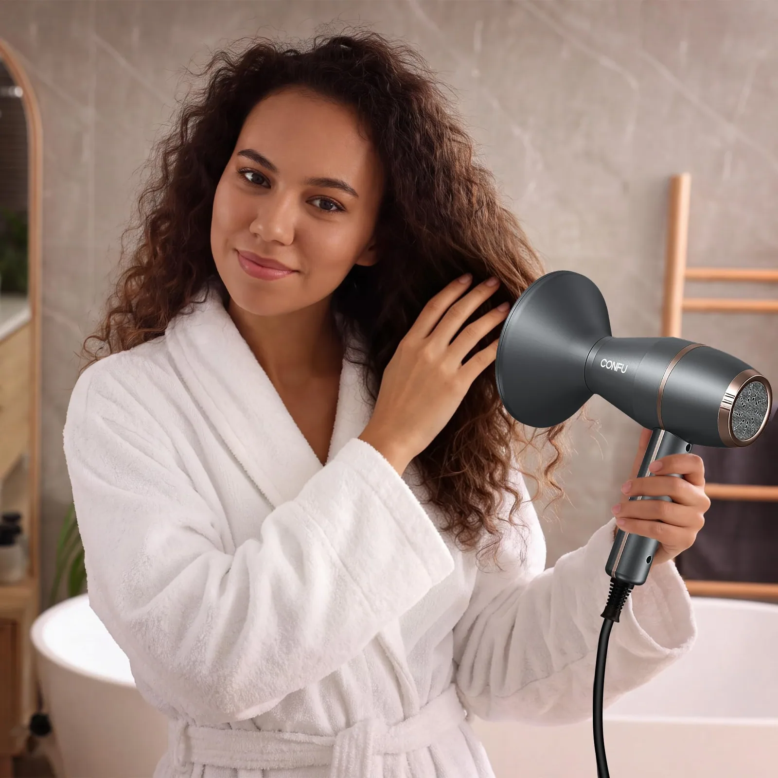 A woman in a bathrobe drying curls with the CONFU 1875W ionic dryer and its diffuser